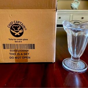 Tulip ice cream sundae glasses. Brand new in the box.